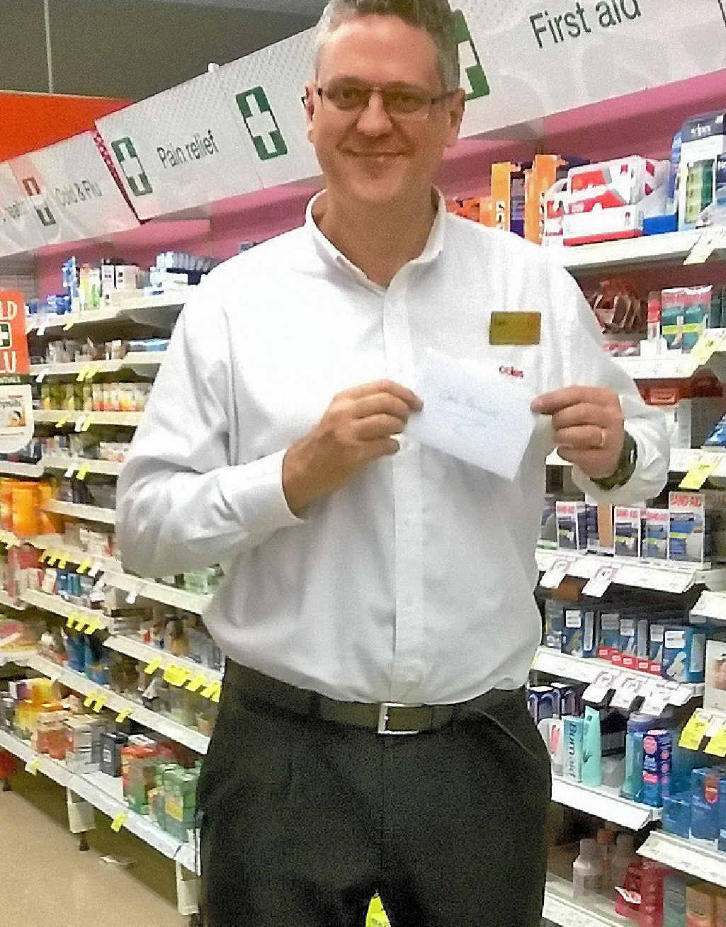 HUMBLE: Coles support manager Carl Falkner with his thank you. HUMBLE: Coles support manager Carl Falkner with his thank you.